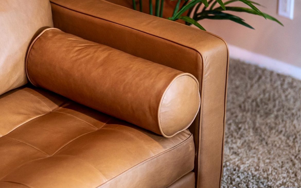 Close-up of the Article Sven sofa’s tufted bench cushion and stitching detail.